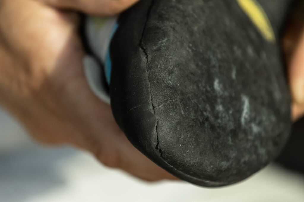 A climbing shoe worn past the ideal time to repair